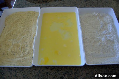 Breading station with flour, egg wash, and breadcrumb mixture