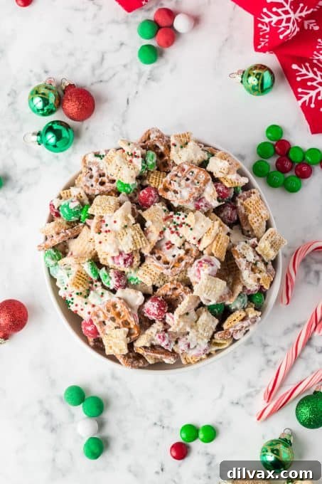 Chex cereal, pretzels and candy make this easy snacking Christmas mix.