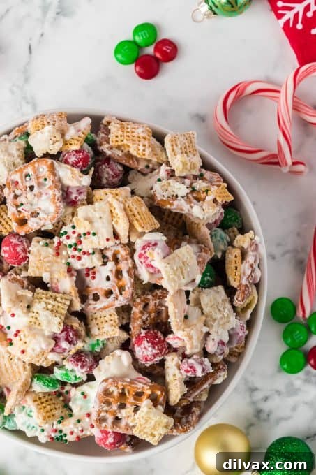 A Christmas Chex Mix with candy.