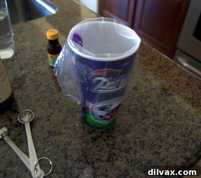 Filled piping bag with white meringue