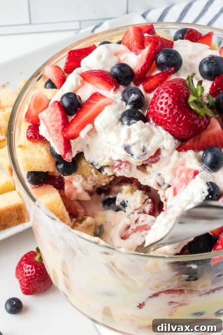 Inside view of a Berry Trifle with soft cake, pudding, and berries