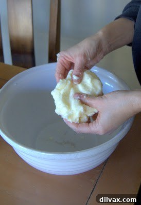 Hand-rubbing butter and sugar together in a large mixing bowl for shortbread dough