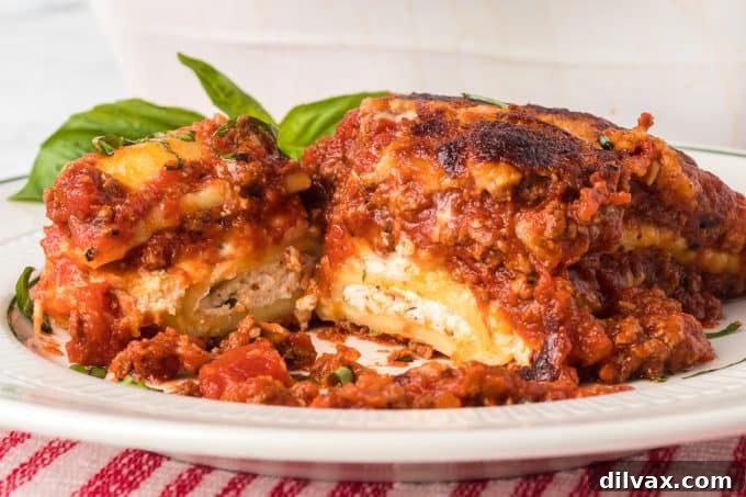A delicious, bubbling Ravioli Lasagna in a baking dish, ready to be served.