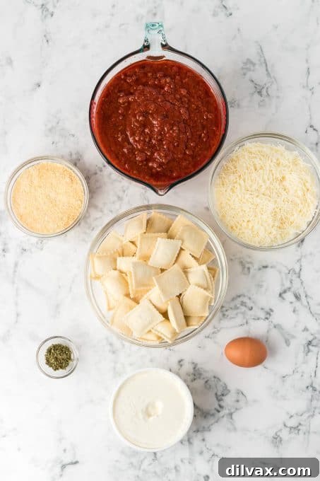Various fresh ingredients laid out on a wooden board, including cheese, ravioli, tomato products, and herbs.