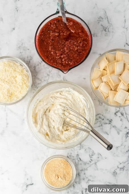 A bowl of ricotta mixture ready for layering in the lasagna.