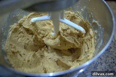 Dough for Ginger Chewies being mixed in a bowl, showing an even color and smooth consistency
