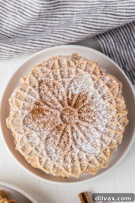 Delicate Pizzelle cookies, beautifully patterned and infused with the warmth of chai spices.