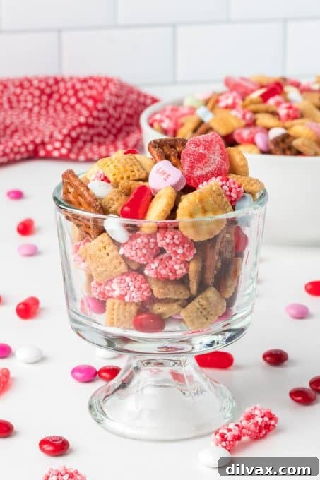 Cupid's Crunch Mix 11 A fun, colorful, and easy dessert for Valentine's Day, showcasing the variety of candies and crunch.