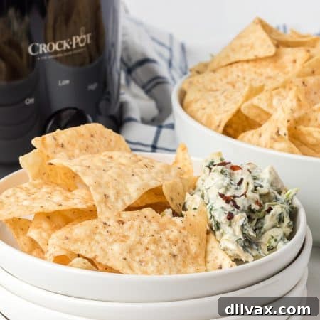 Warm & Cheesy Slow Cooker Spinach Artichoke Dip 11 Crockpot Spinach Artichoke Dip