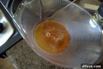Strained honey syrup in a bowl