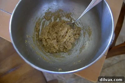 Walnut filling being mixed with honey syrup