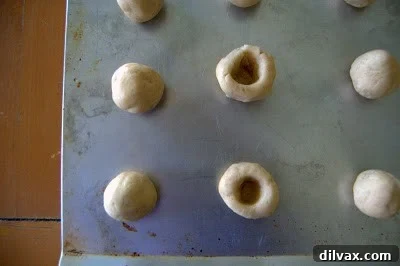 Dough ball with a hole pressed into its center