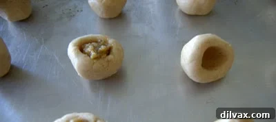 Filling a dough ball with walnut mixture