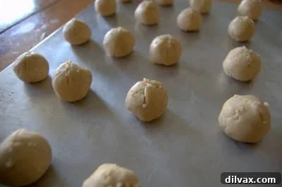 Scoring an 'X' on top of a cookie dough ball