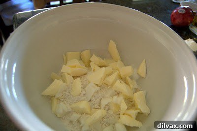 Small pieces of butter and shortening added to flour