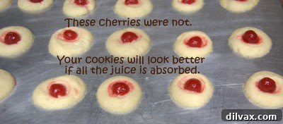 Close-up of chocolate being drizzled onto cookies