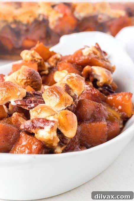 Molasses Glazed Sweet Potatoes in a serving bowl, ready for guests.