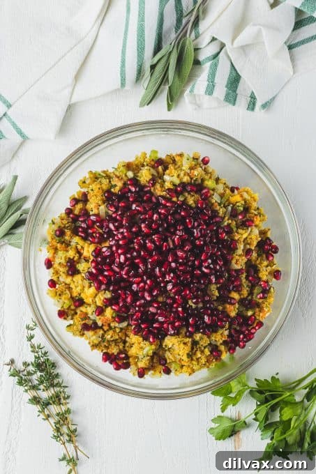 Jeweled Stuffing 6 Top view of Thanksgiving stuffing artfully garnished with fresh pomegranate arils.