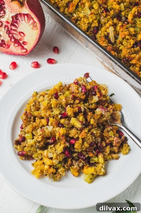 Jeweled Stuffing 7 A serving of pomegranate dressing on a plate, ready to be enjoyed.