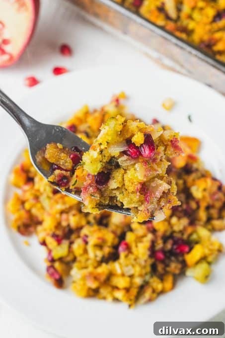 Jeweled Stuffing 9 A forkful of Pomegranate Dressing, showing the texture and mix of ingredients.