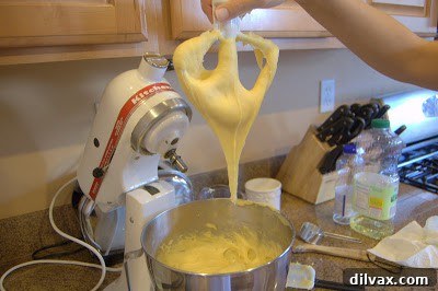 A Two Day Baking Bonanza 11 Pâte à choux dough dripping off a paddle attachment, not yet forming the perfect V-shape.