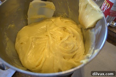 A Two Day Baking Bonanza 14 Piping bags filled with pâte à choux dough, ready for forming eclair shells.