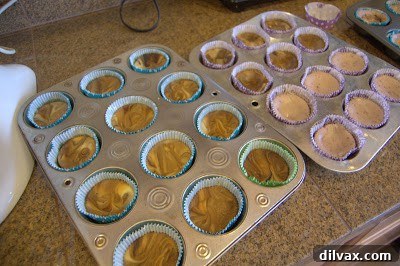 A Two Day Baking Bonanza 21 A cheesecake being carefully filled, showcasing its smooth, creamy texture before setting.