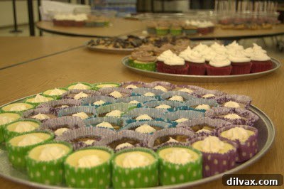 A Two Day Baking Bonanza 25 A table laden with various desserts at the high school cafeteria banquet.