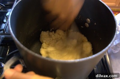 A Two Day Baking Bonanza 5 Dough forming a ball in a saucepan after flour has been stirred in vigorously off the heat.