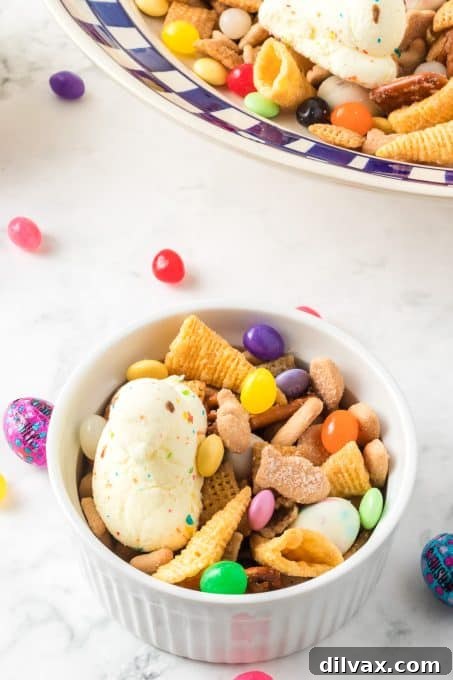 A close-up of a delightful Easter Snack Mix, showcasing colorful candies and crunchy cereals in a festive display.