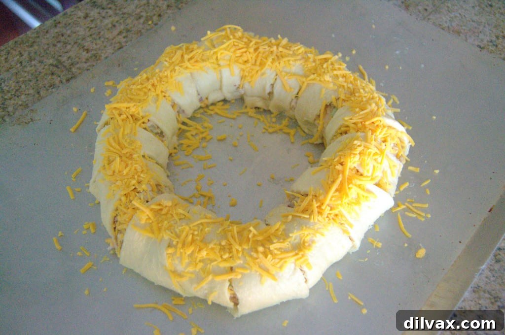 Budget-Friendly Barbecue Chicken Salad Crescent Ring 11 Barbecue Chicken Salad Crescent Ring fully assembled with cheese, ready for baking