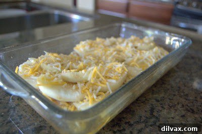 Harvest Apple and Cheesy Chicken Bake 8 A delicate dusting of freshly ground nutmeg completes the pre-bake preparation