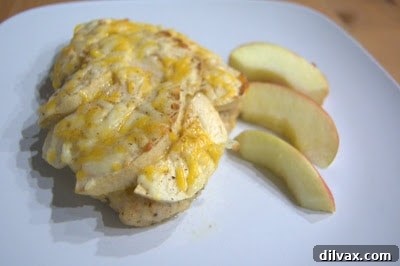 Harvest Apple and Cheesy Chicken Bake 10 A close-up view of the perfectly baked Apple Cheese Chicken, golden and ready to serve