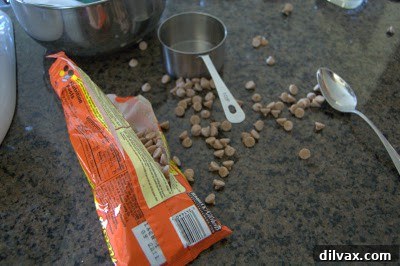 A playful image showing spilled peanut butter chips after opening a bag.