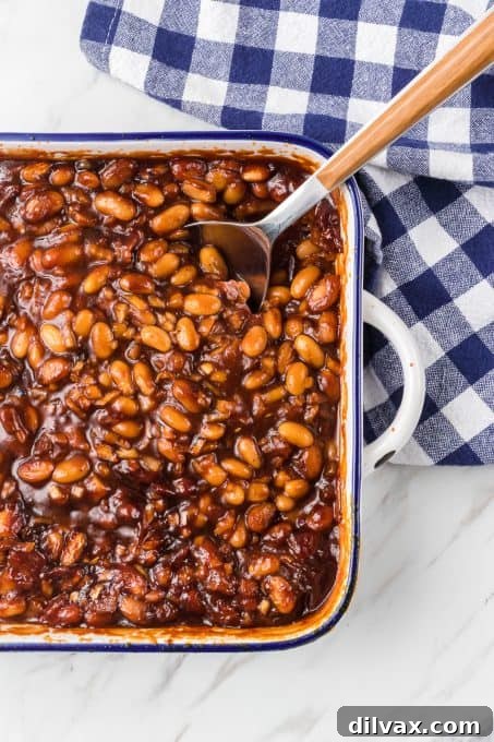 Sweet & Savory Bean Bake 9 Beans made from scratch, baked in the oven in a round ceramic dish.