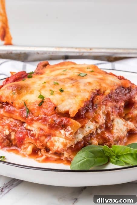 Close-up of a perfectly sliced Lasagna with Cottage Cheese, showing distinct, creamy layers.