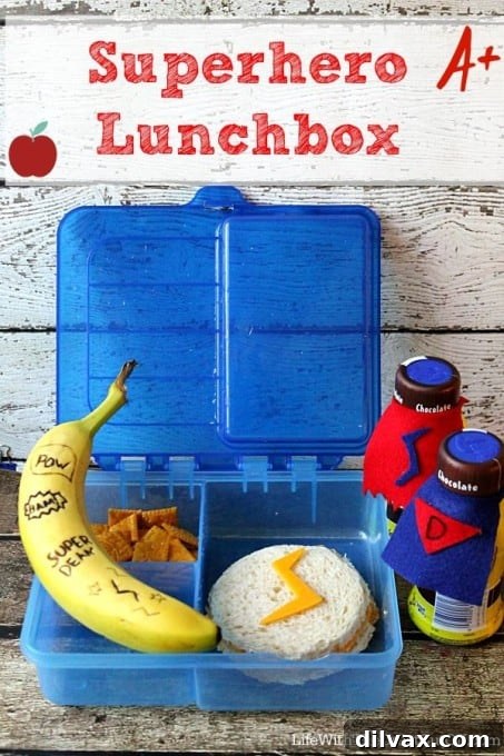 More Than 25 Creative Back to School Lunch Ideas 4 A superhero-themed lunchbox with sandwiches cut into star shapes, colorful fruits, and veggie sticks, perfect for inspiring young heroes.