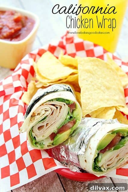 More Than 25 Creative Back to School Lunch Ideas 8 A fresh California chicken wrap, sliced to show its colorful fillings of chicken, lettuce, and other vegetables.