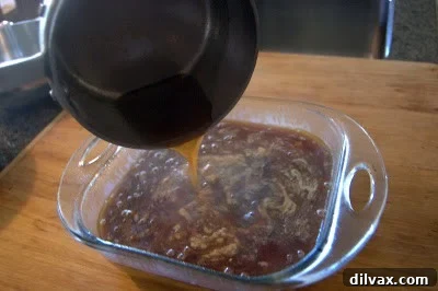 Spiced Apple Cider Pudding Cake 15 Top view of a sliced piece of Apple Cider Pudding Cake