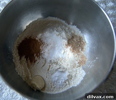 Spiced Apple Cider Pudding Cake 4 Combining wet and dry ingredients for the cake