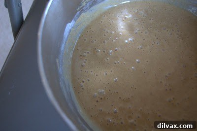 Spiced Apple Cider Pudding Cake 7 Sprinkling streusel topping over the batter