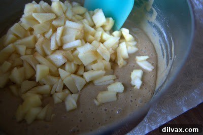 Spiced Apple Cider Pudding Cake 8 Gently pouring apple cider over the streusel-topped batter
