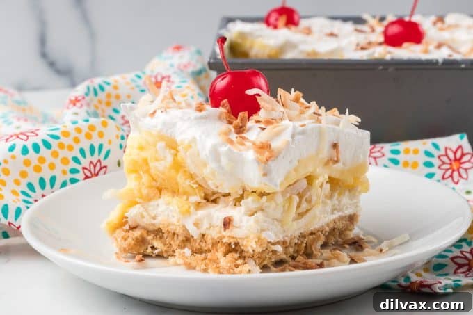Pina Colada Bliss Bars 2 Pina Colada Dream Bars - A vibrant, layered tropical dessert