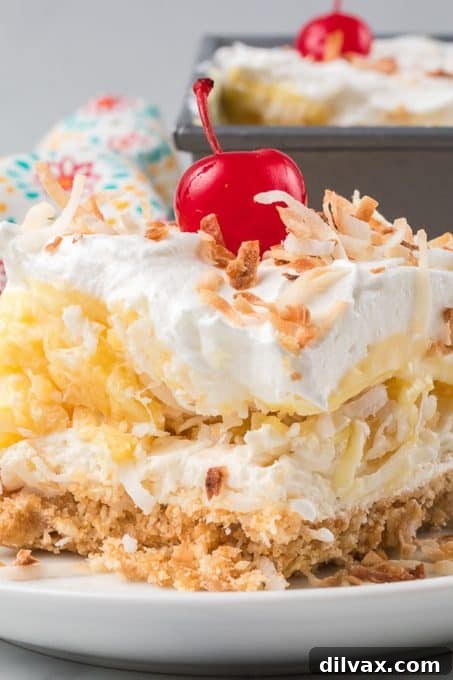 Pina Colada Bliss Bars 3 Pina Colada Dream Bars sliced and garnished