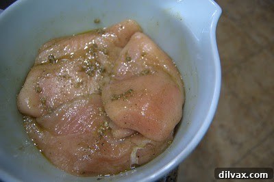 Day 262 Delights: Roast Chicken, Sweet Butternut Squash, and Crispy Potatoes 3 Chicken breasts seasoned in a bowl