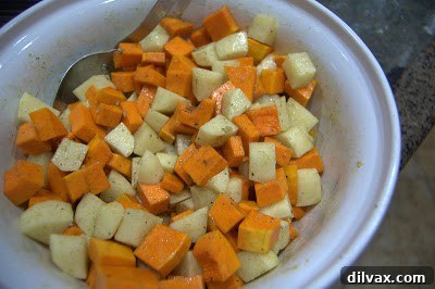 Day 262 Delights: Roast Chicken, Sweet Butternut Squash, and Crispy Potatoes 5 Seasoned butternut squash and potatoes ready for roasting