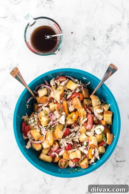 Rustic Chicken Panzanella 7 Homemade balsamic dressing for a panzanella salad with chicken, ready to be drizzled.