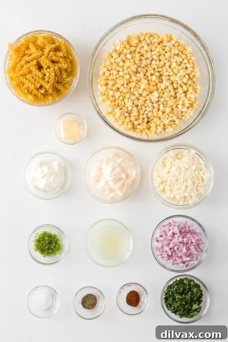 Ingredients for Mexican Street Corn Pasta Salad laid out on a table.