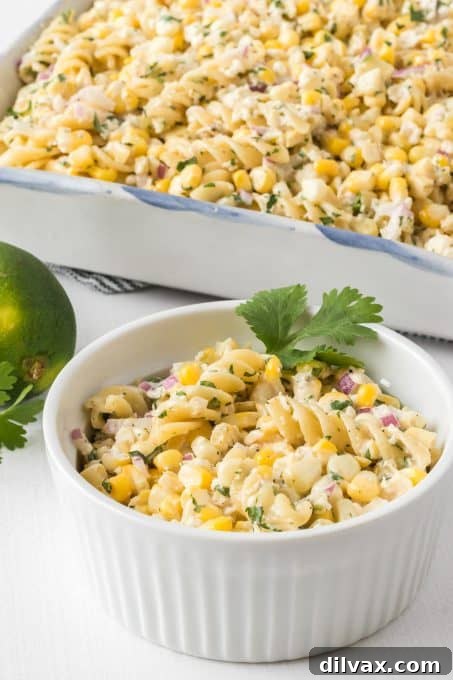 Easy Mexican street corn in a vibrant pasta salad, ready to serve.