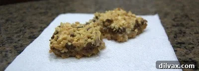 Freshly baked Magic Cookie Bars cooling on a wire rack.